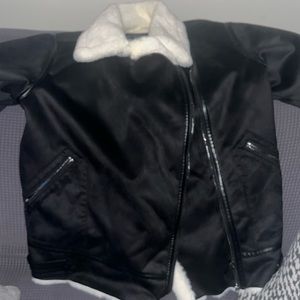 A soft fur inside black coat